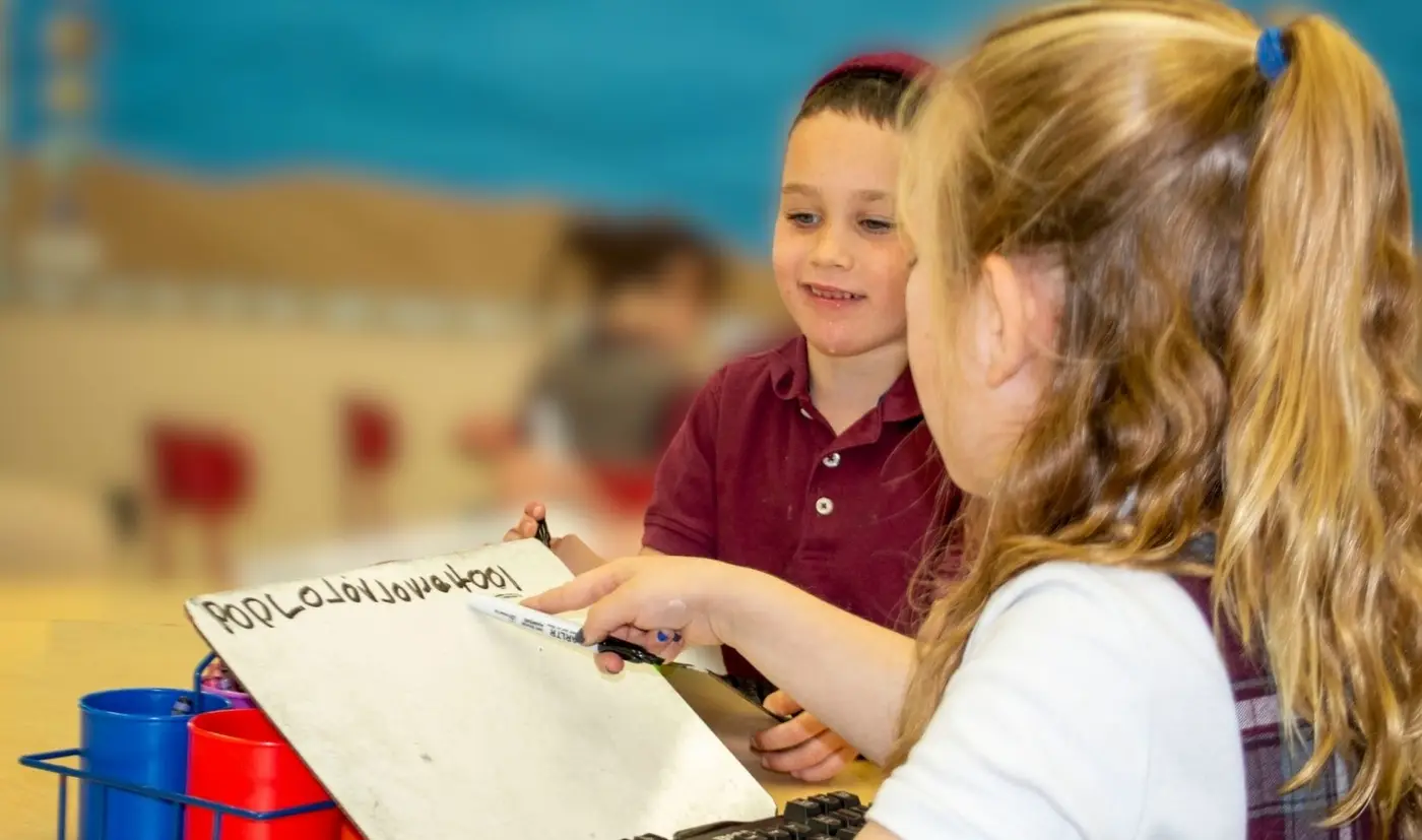 Joyful group work—friendship, belonging, and shared pride.