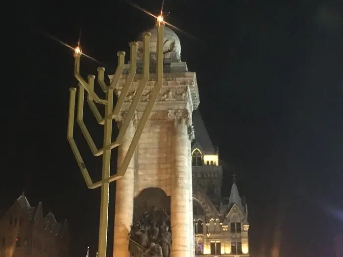 Syracuse celebrates first night of Hanukkah by lighting Clinton Square menorah