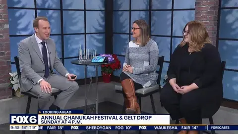 Fox6 interviewing two women about the Chanukah Festival