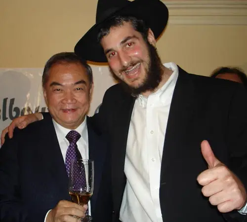 Lord Mayor of Melbourne Cr John So saying L'Chaim with Semicha student Sholom Ber Ceitlin