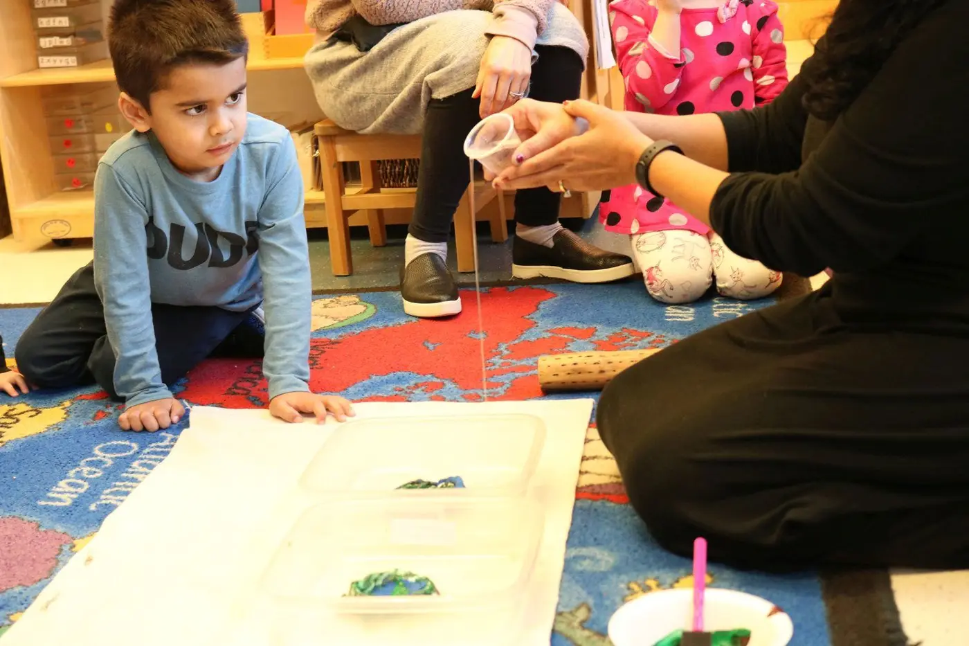 GEOGRAPHY Children learn about the world around them with the use of globes, puzzle maps and geographical formations.