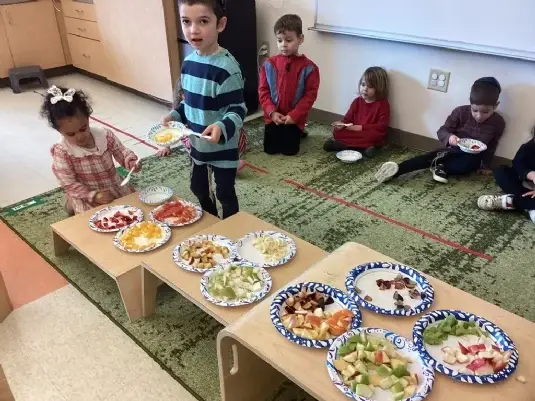 Our Chickadees Celebrate Tu B’Shvat with a Colorful Fruit Salad