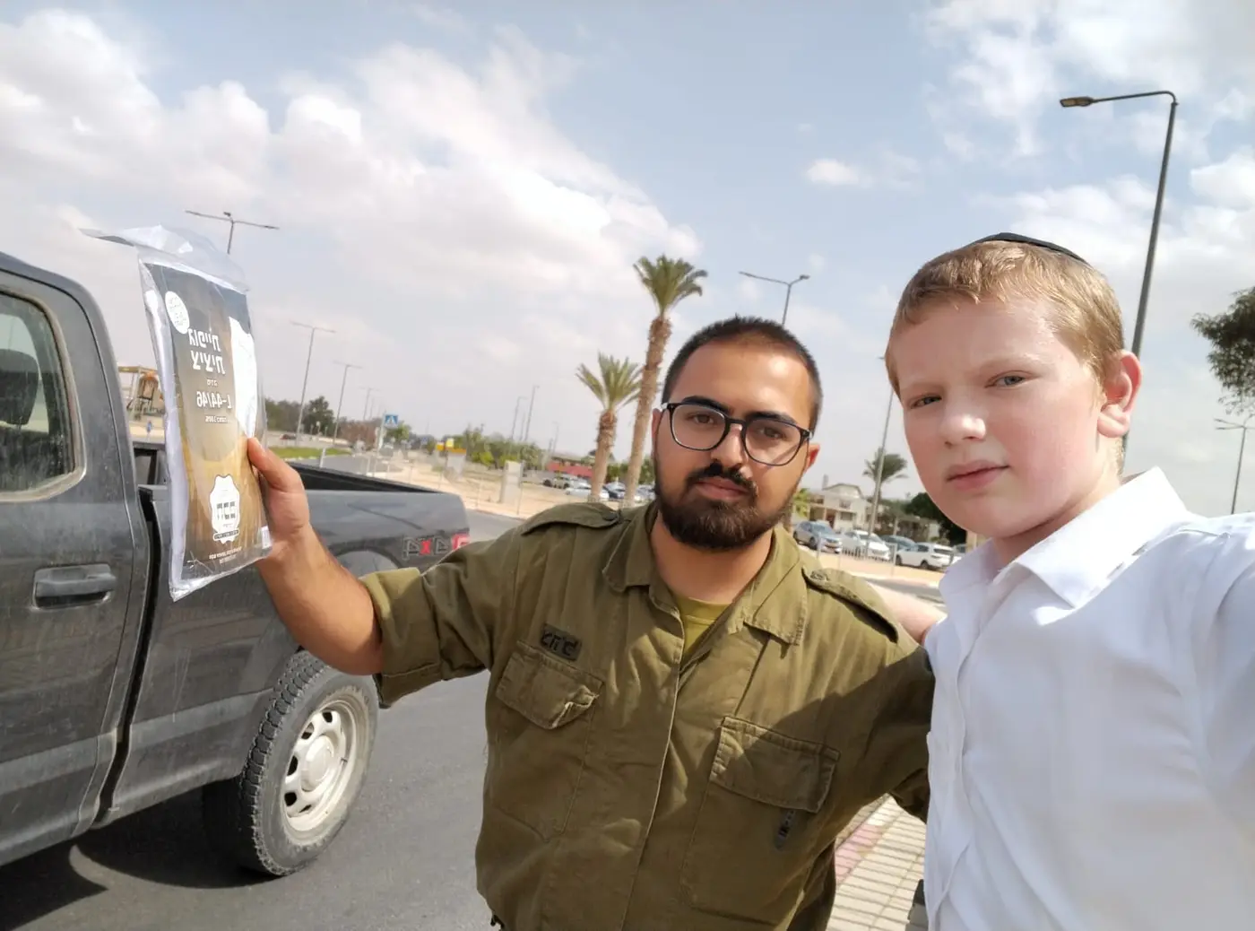 Rabbi Meir's Son on the Job Delivering Supplies and Inspiration to soldiers