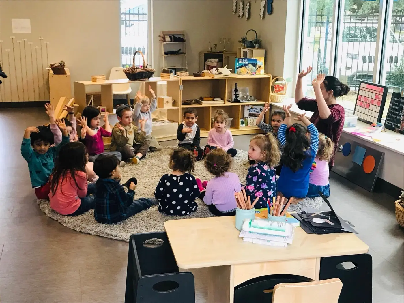 Preschoolers enjoying circle time at Ganeinu Preschool in Jacksonville Florida