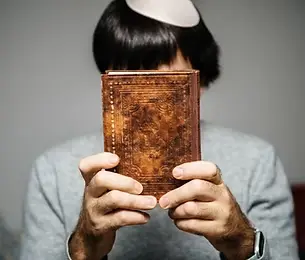 Jewish male with siddur Depositphotos_229405172_xl-2015.jpg