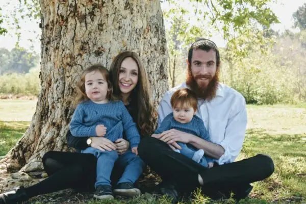 Chabad Atwater Village family sitting beneath a tree