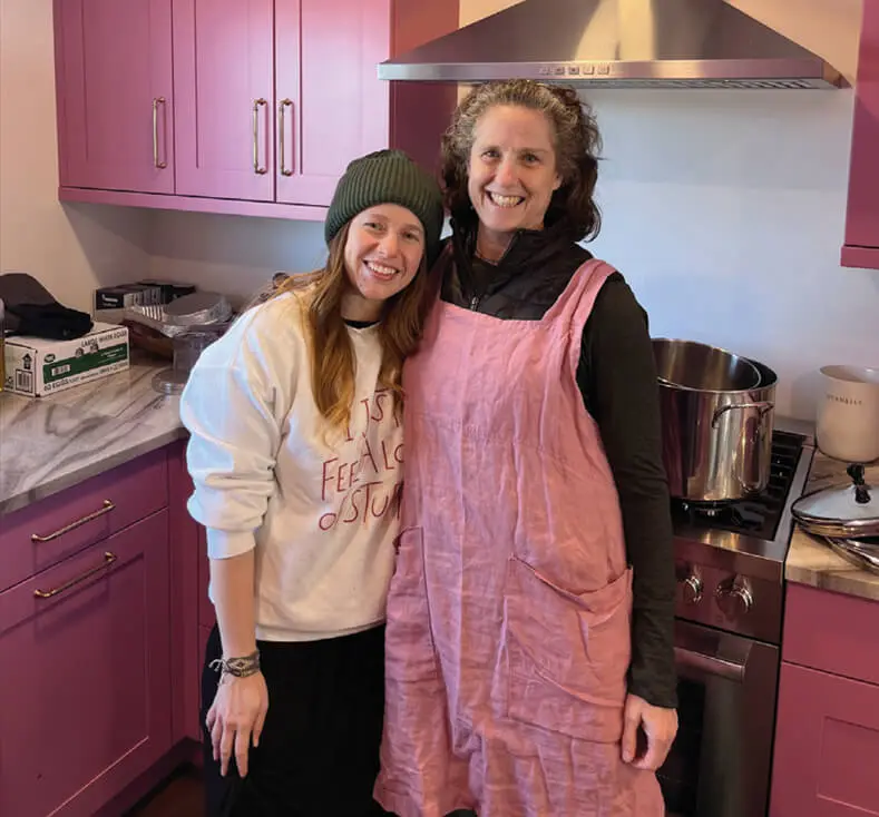 Sarah helping Chavie cook for Shabbos