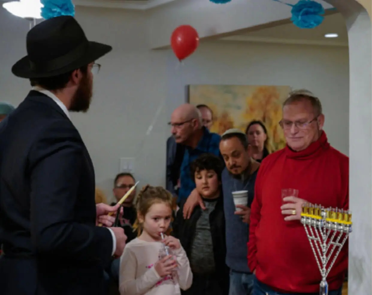 Elliott at Chabad of Missoula's Chanukah celebration in 2018.
