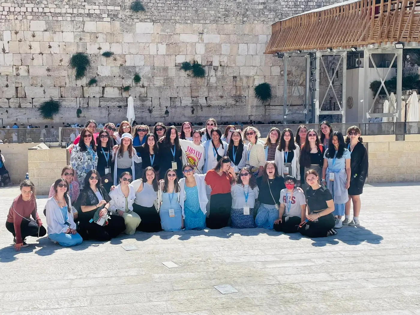 cteen girls in at the Kotel in Israel