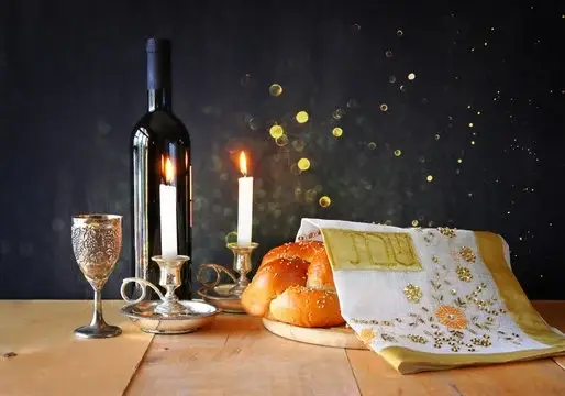 Description Includes: 2x candles, 2x challah, kiddush cup, grape juice. Order by Wednesday evening.