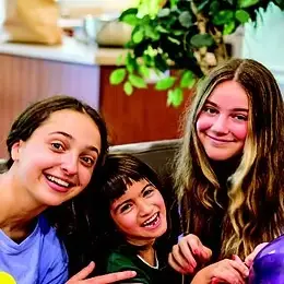 Friendship Circle Kansas City Volunteer with child participant .
