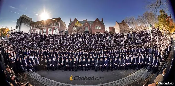 Thousands of Chabad-Lubavitch emissaries gather in front of Chabad-Lubavitch world headquarters.