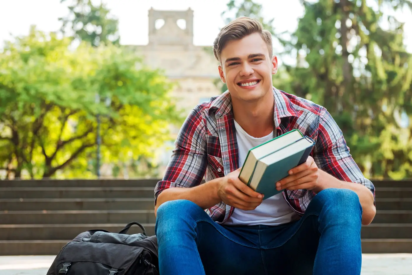 Young man with books